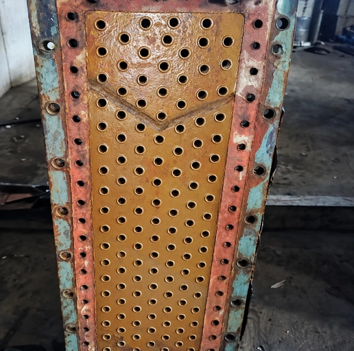 Heat-exchanger tube-sheet cleaning after treatment