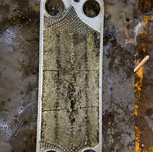 Plate heat-exchanger cleaning before treatment